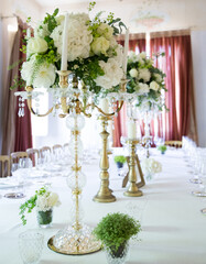 Wonderful flowers on a ceremony table in a villa