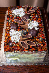 Chocolate birthday cake on plate