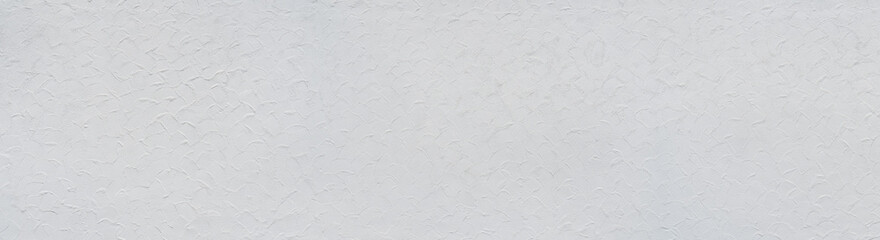 Weiße neue Panorama Wand in Nahaufnahme mit abstrakter Textur im Putz