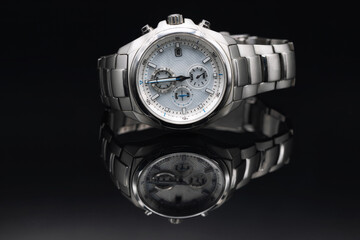 Stylish expensive men's wristwatch in titanium case