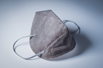 Gray respirator on a white background