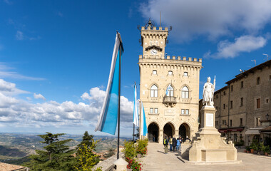 view of Liberty Square and statue with the Palazzo Pubblico in the capital of San Marino - obrazy, fototapety, plakaty