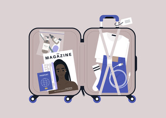 Open suitcase with personal belongings packed into it, travel concept, airport security check