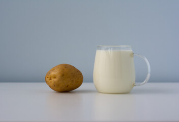 Powdered vegan milk. Potato milk close-up. Selective focus. Side view