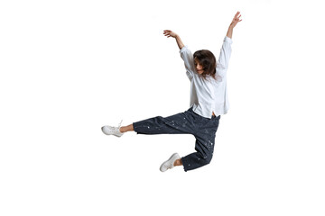 Fototapeta na wymiar One pretty woman in casual wear jumping, flying isolated on white background. Art, motion, action, flexibility, inspiration concept.