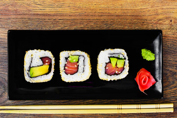 Sushi Alaska on Woody Background
