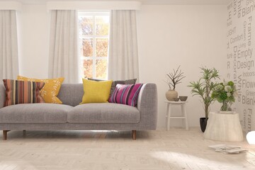 Stylish room in white color with sofa and autumn landscape in window. Scandinavian interior design. 3D illustration