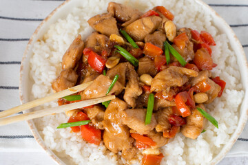 kung pao chicken with chopsticks. asian cuisine