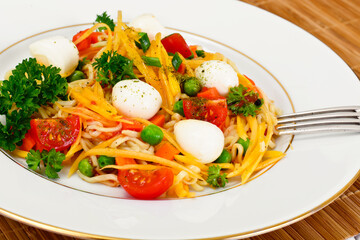 Warm Salad of Noodles, Pumpkin, Carrots, Peas with Cherry Tomato
