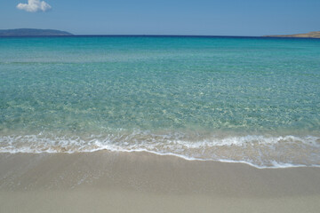 Fototapeta na wymiar Beautiful sandy beach of Simos with crystal clear turquoise sea and natural sand dunes, Elafonisos island, Peloponnese, Greece