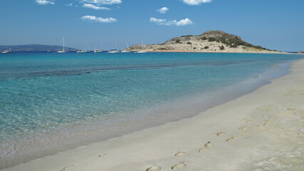Beautiful sandy beach of Simos with crystal clear turquoise sea and natural sand dunes, Elafonisos island, Peloponnese, Greece