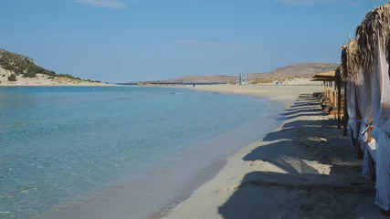 Outdoor kussens Beautiful sandy beach of Simos with crystal clear turquoise sea and natural sand dunes, Elafonisos island, Peloponnese, Greece © aerial-drone