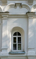 Fototapeta premium Ancient windows of the Transfiguration Cathedral in the city of Chernigov. The temple was founded in 1679 and was built with elements of Ukrainian baroque and early classicism