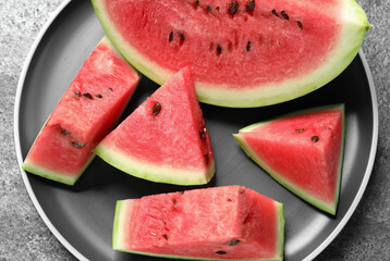 Delicious fresh watermelon slices on table, closeup