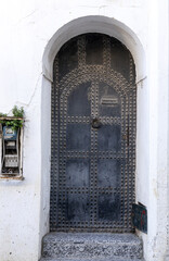Arab architecture in the old medina. Streets, doors, windows, details
