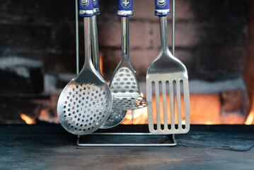 Rural kitchen utensils on the table close up abstract background.