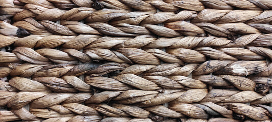 background in the form of weaving from a vine or rattan
