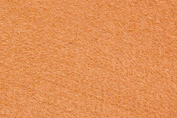 The texture of light orange felt background