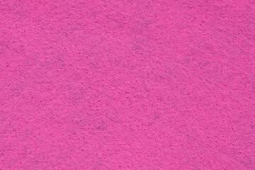 Light pink-coloured felt. Non-woven fabric texture