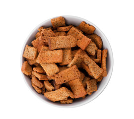 Crispy rusks with seasoning in bowl isolated on white, top view