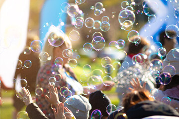 Children's street party with soap bubbles