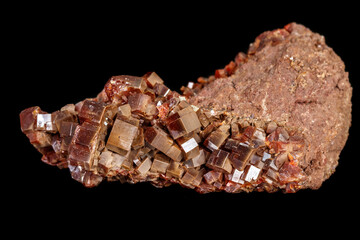 Macro mineral stone Vanadinite on a black background