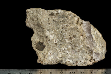 Macro mineral stone Pyrite on a black background