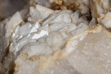 Macro mineral stone Snow quartz with calcite on a black background