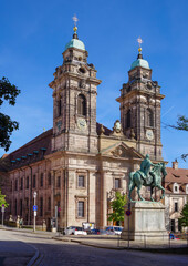 Fototapeta na wymiar St. Egidien-Kirche in Nürnberg, Germany. In front of the church the monument of Kaiser Wilhelm I
