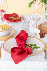 Table served for Christmas dinner in living room