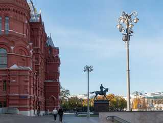 Fototapeta na wymiar View of Manezhnaya Square in Moscow. Monument to Marshal Zhukov, building of the historical museum.