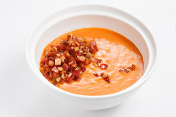 Bowl of cream soup with pumpkin with bacon. Restaurant menu