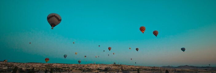 Hot air balloons on Cappadocia Sky at sunrise. Hot air balloon banner photo