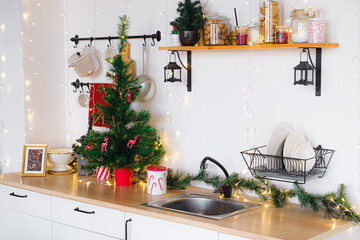 Loft style Interior white kitchen with christmas decor, xmas