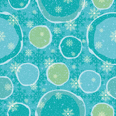 Abstract winter seamless vector pattern illustration with snow balls in shades of blue with falling snow flakes. Great for seasonal Christmas wrapping paper, decorations and greeting cards.
