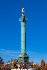 Fototapeta na wymiar Paris, place de la Bastille, column with statue of the golden angel in autumn 