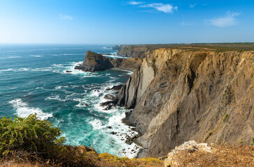 Fototapeta na wymiar Algarve west coast in Portugal. Arrifana cliffs.