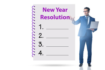 Businessman in new year resolution concept