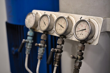 Pressure gauge psi meter in pipe and valves of water, oil and gas system industry 