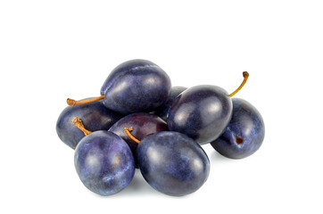 Blue plums isolated on white background