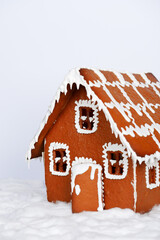 The hand-made eatable gingerbread house and snow decoration - 468669698