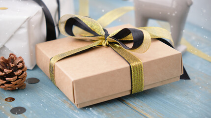 gift christmas boxes on a wooden background