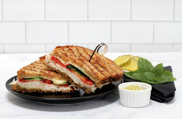 Turkey, basil, provolone cheese, basil and tomato panini