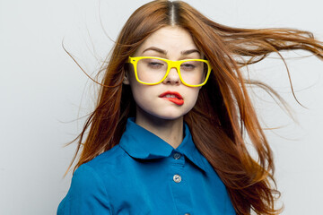 woman wearing yellow glasses red lips home fashion elegant style