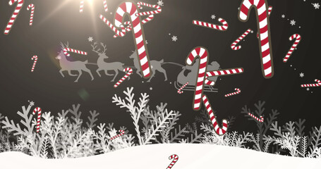 Image of merry christmas text over candy cane falling and winter landscape