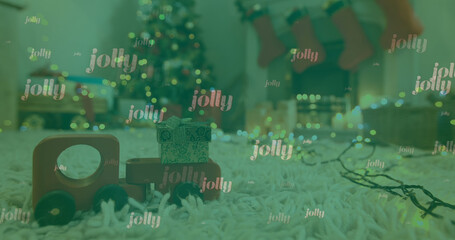 Image of jolly text on green over presents and christmas tree in decorated living room