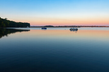 dawn illuminates lake champlain in saint albans bay vermont