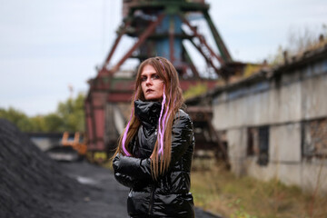 Young woman in industrial place