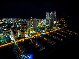 Fototapeta na wymiar Aerial night drone photo Miami Beach Marina South Pointe