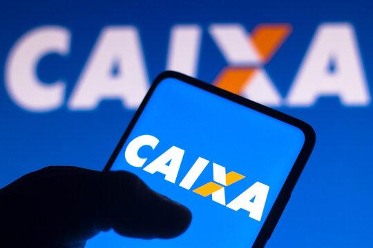 November 11, 2021, Brazil. In this photo illustration the Caixa Econômica Federal (CEF) logo seen displayed on a smartphone screen and in the background.